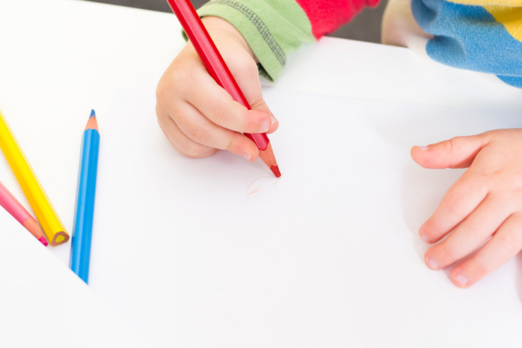 child working on letter r worksheets for preschoolers